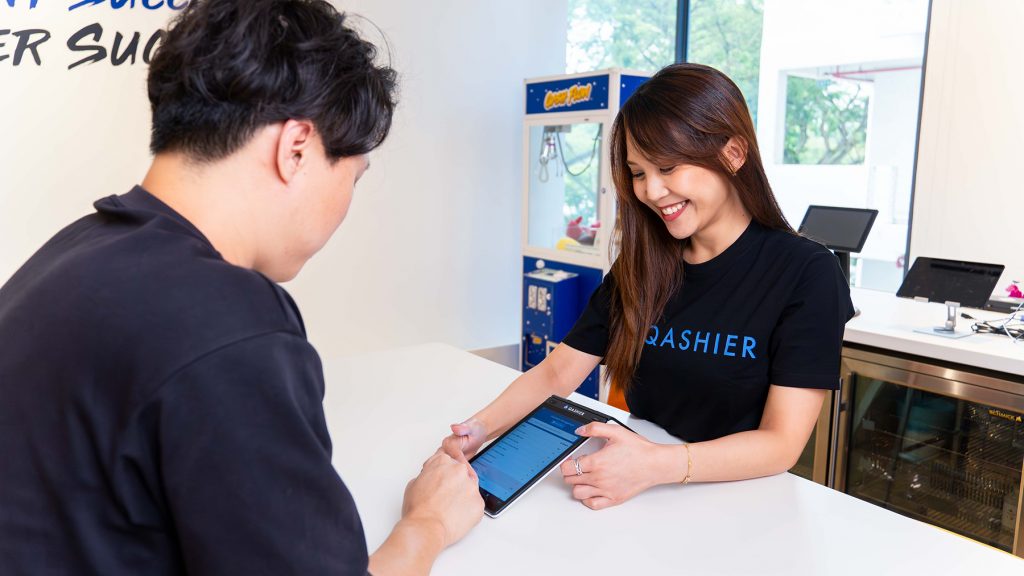 Staff using QashierX2 terminal