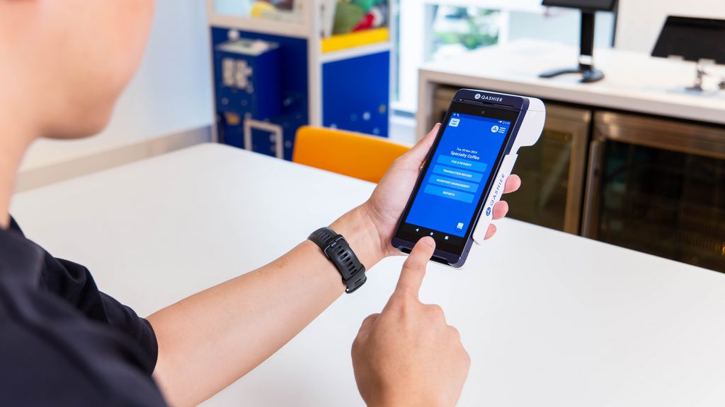 Staff using QashierXS SuperTerminal