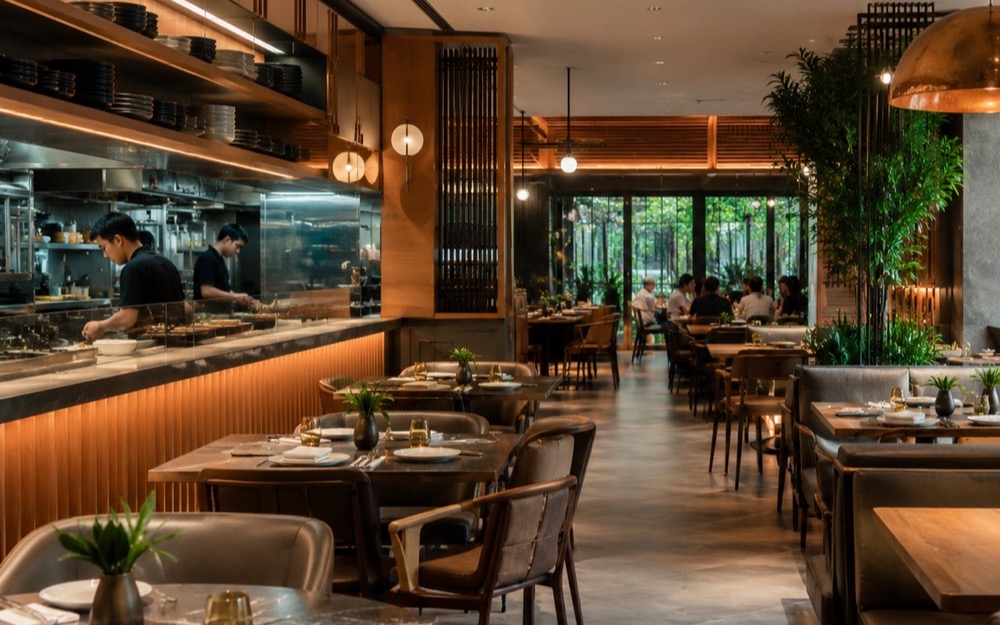 Restaurant dining room with an open kitchen counter