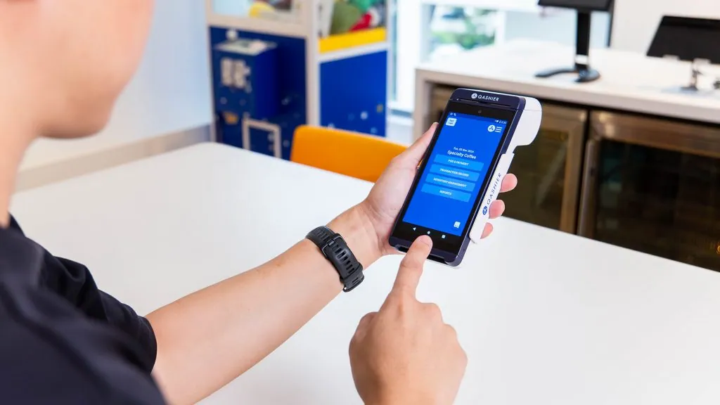 Staff using QashierXS SuperTerminal