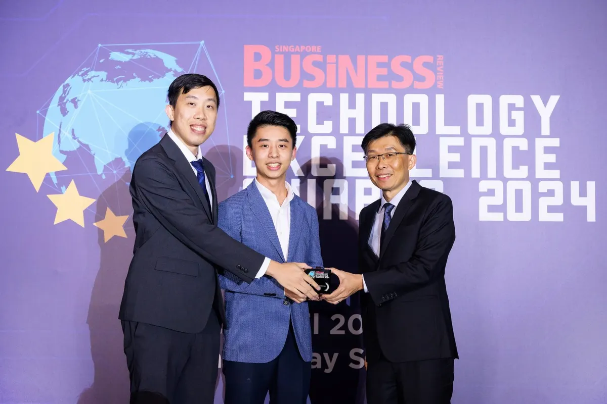 The Qashier team receiving the Singapore Business Review Technology Excellence Award 2024